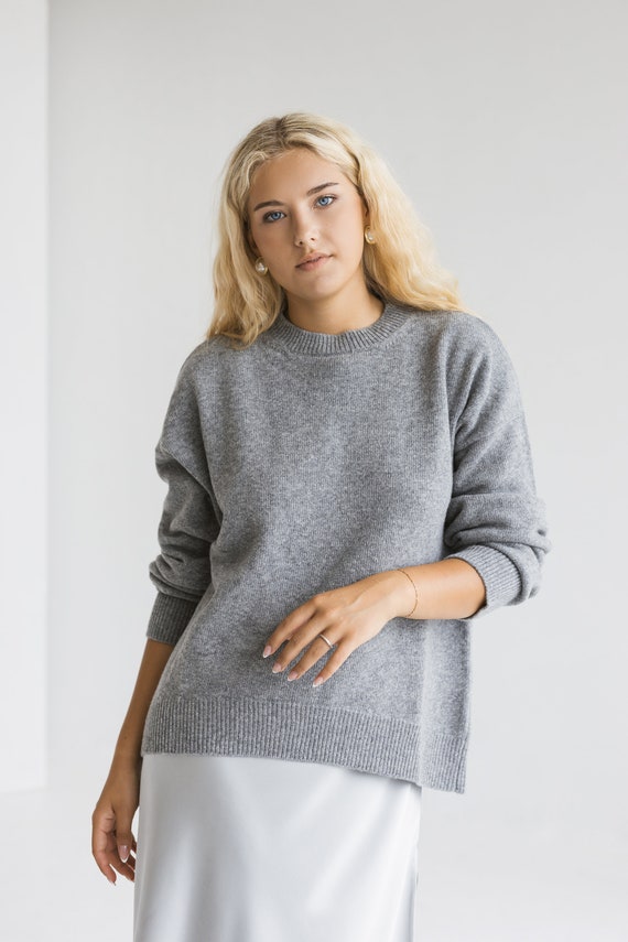 Gray knitted merino wool sweater for women, bright grey women's knit minimalist pullover with longer back, light gray jumper