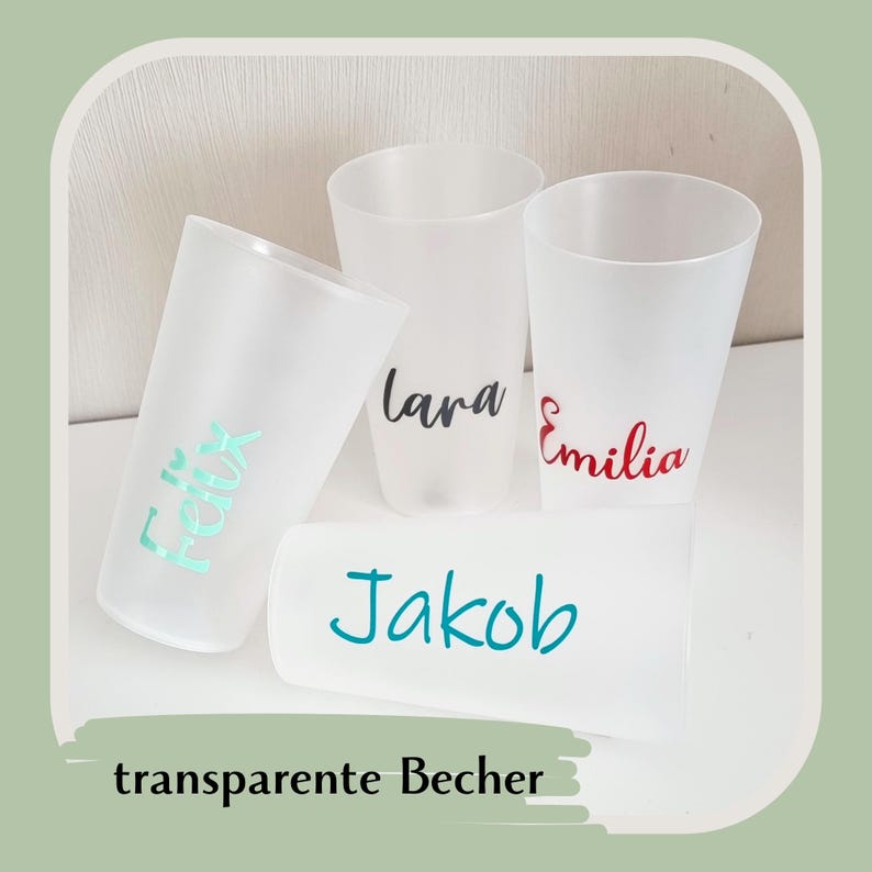 May include: Four frosted plastic cups with names Felix, Lara, Emilia, and Jakob in various colors. The text "transparente Becher" is at the bottom. The cups are on a white surface.