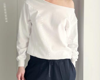 White oversized handmade sweatshirt with raw wide neckline falling off shoulder – loose, feminine and soft loungewear