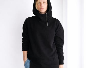 Black oversized hoodie with asymmetric hem and side zip