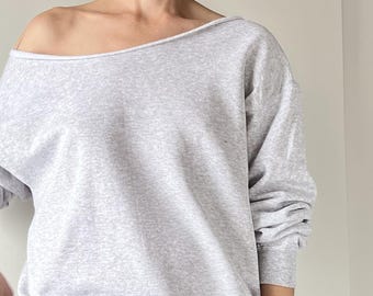 Grey oversized handmade sweatshirt with raw neckline falling off shoulder – soft, loose and feminine, made by women for women