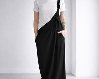 Black asymmetrical women’s overalls in linen viscose