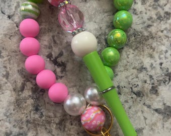 Wrislet and Pen Set - Pink & Lime green Handmade using 1.5 nylon to make the wristlet beautifully designed with love. Custom designs availab