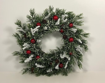 Small Short Needle Evergreen Christmas Wreath with Berries and Pine Cones Lightly Flocked with Snow.Farmhouse Christmas Decor