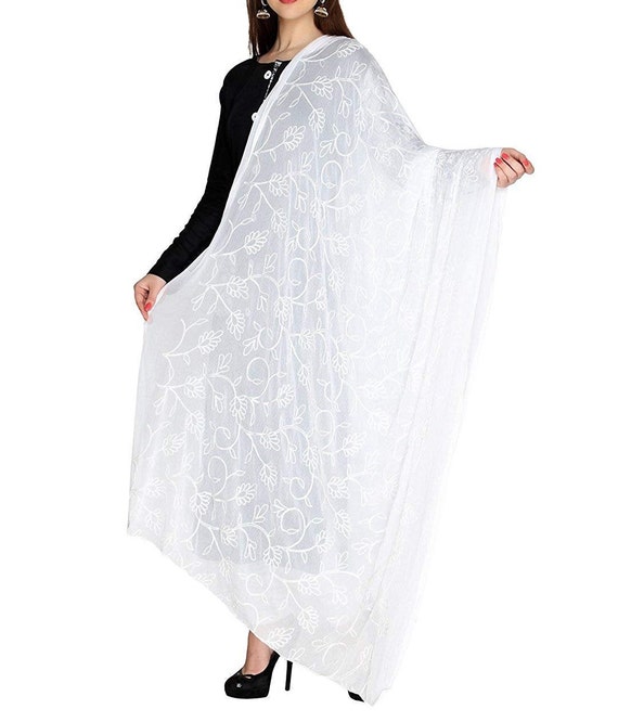 white salwar kameez with multicolor dupatta