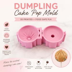May include: A pink, hinged, 3D-printed food-safe PLA dumpling cake pop mold. The open mold displays a pleated interior on one side and a circular opening on the other. Text includes DUMPLING Cake Pop MOLD, 3D PRINTED, FOOD SAFE PLA, HAND WASH ONLY, HANDLE WITH CARE, and EASY TO USE & CLEAN.