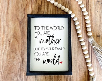 To the world you are a mother but to your family you are the world Wood sign