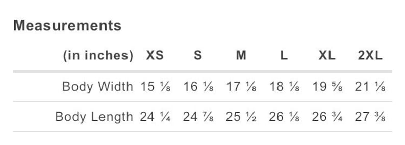 May include: Measurements chart in inches for a garment, showing body width and body length for sizes XS to 2XL. Body width ranges from 15 ⅛ inches to 21 ⅛ inches. Body length ranges from 24 &frac14; inches to 27 ⅜ inches.