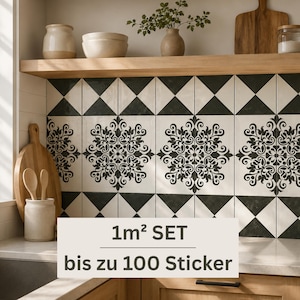 May include: A set of square wall tiles featuring a black and white damask pattern alternating with solid black and white triangles. The tiles are displayed on a kitchen backsplash with text overlay reading 1m² SET bis zu 100 Sticker.