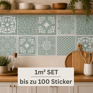 May include: A set of square wall tiles featuring a sage green and white color palette with various floral, geometric, and damask patterns. The text on the overlay reads 1m&sup2; SET bis zu 100 Sticker, indicating a coverage area and quantity of stickers.