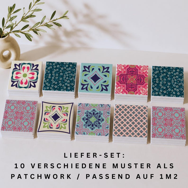 May include: A set of ten square tiles featuring diverse decorative patterns in shades of pink, blue, green, and dark teal. The text below reads: LIEFER-SET: 10 VERSCHIEDENE MUSTER ALS PATCHWORK / PASSEND AUF 1 M2. The tiles are arranged in two rows.