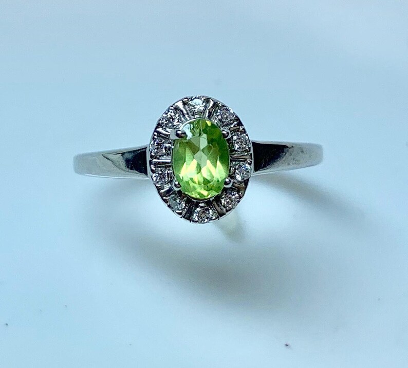 925 Solid Sterling Silver with Rhodium Polished Ring With Peridot