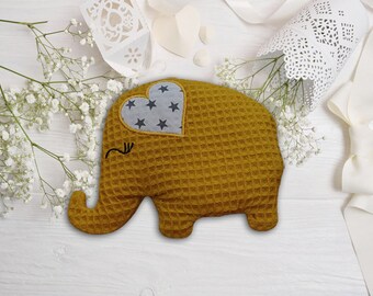 AVAILABLE IMMEDIATELY | Heat cushion *Little Elephant* made of cotton in the color ocher