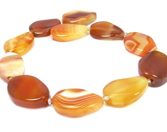 Agate à bande rouge grandes tranches d'agate torsadées ovales brin de perles de pierres précieuses pour collier et plus