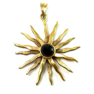 Radiant sun with onyx - large bronze pendant