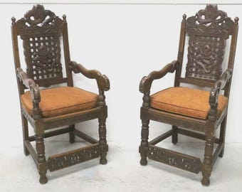 Pair of Antique Heavily Hand Carved Wooden Armchairs