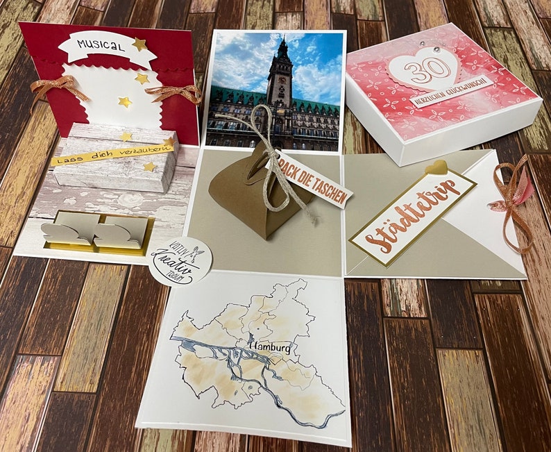 Explosionsbox Geschenkverpackung Gutscheinverpackung Musical Hamburg Städtetrip Bild 1