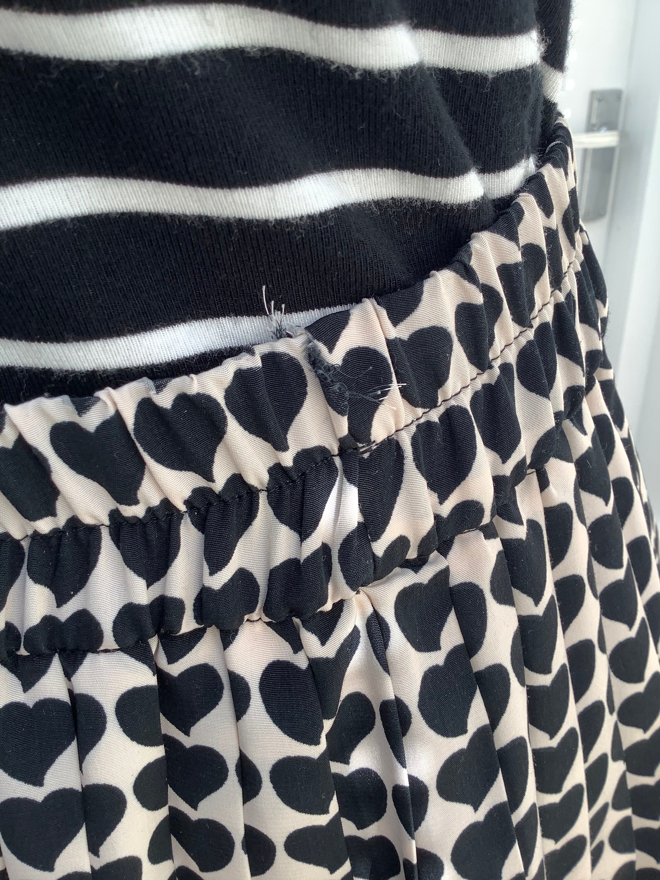 Pink Pleated Skirt with Lace and Heart Embellishments main image 1
