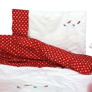 Embroidered children&#39;s bed linen 100x135