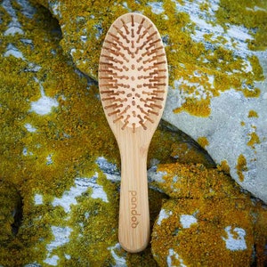Bamboo hairbrush with natural bristles image 6
