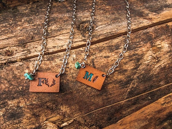 Tooled Leather Initial Necklace With Turquoise Bead letter