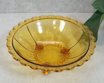 charming little bowl, bowl. Pastry bowl made of amber glass