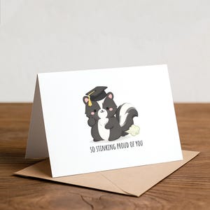 May include: A set of three ceramic mugs with a speckled, matte finish. The mugs are in shades of cream, light brown, and dark brown. Each mug has a simple, minimalist design, perfect for coffee or tea.