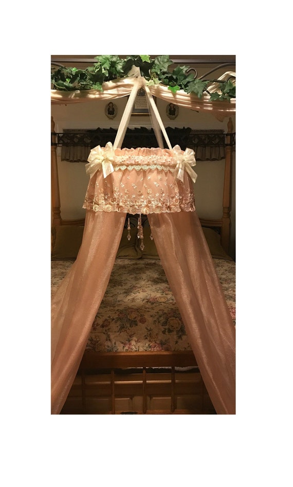 swinging crib canopy