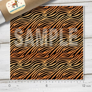 May include: A 12-inch square sheet of orange and black tiger stripe vinyl. The vinyl is a repeating pattern of orange and black stripes.