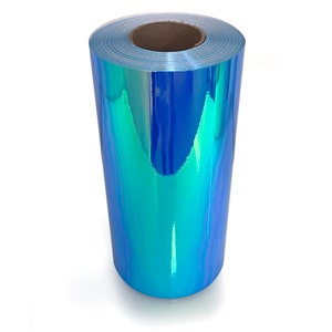 Puede incluir: Un rollo de pel&iacute;cula de vinilo azul iridiscente con acabado hologr&aacute;fico.