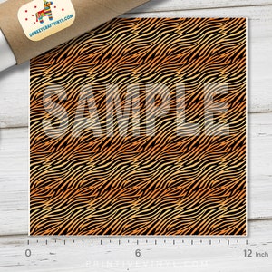 May include: A 12-inch by 12-inch sample of orange and black zebra print vinyl. The vinyl has a repeating pattern of wavy stripes.