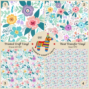 May include: Four floral pattern vinyl samples. The top left features large flowers in pink, purple, yellow, and blue. The top right has a similar design. The bottom two samples have smaller, repeating floral patterns. The image includes the text "Printed Craft Vinyl" and "Heat Transfer Vinyl".