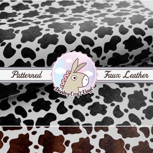 May include: Black and brown faux leather fabric with a cow print pattern. The fabric is textured and has a slight sheen. The text "Patterned Faux Leather" is visible on the fabric.
