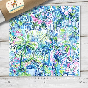 May include: A 12-inch square of blue, green, pink, and white patterned fabric featuring palm trees, flowers, and houses. The fabric is perfect for crafting projects like tote bags, pillows, and headbands.
