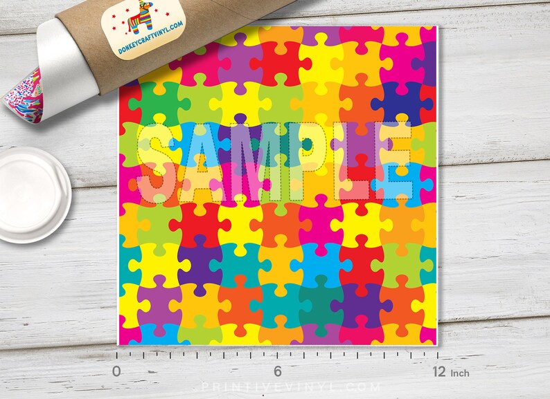 May include: A colorful jigsaw puzzle pattern with a white "SAMPLE" text overlay. The pattern is made up of many different colored puzzle pieces, including red, orange, yellow, green, blue, purple, and pink. The puzzle pieces are arranged in a random pattern.