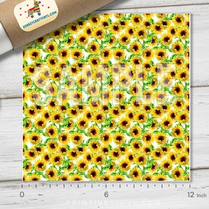 May include: A sheet of vinyl featuring a repeating pattern of yellow sunflowers with green leaves on a white background. The word "SAMPLE" is printed across the center. The sheet is approximately 12 inches wide.