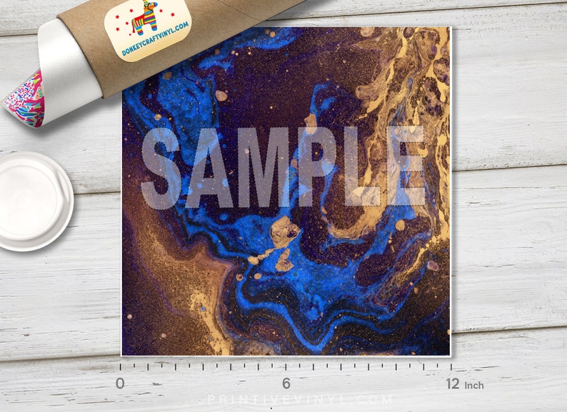 May include: Square print with a swirling abstract design in shades of blue, gold, and black. The word "SAMPLE" is printed across the center. The print is approximately 12 inches wide.
