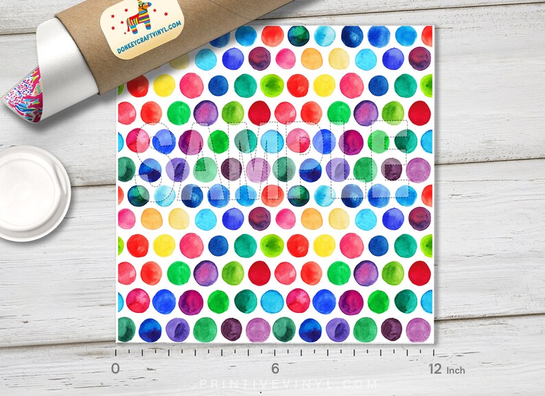 May include: A colorful polka dot pattern with watercolor effect, featuring a repeating pattern of vibrant circles in red, orange, yellow, green, blue, and purple. The word "SAMPLE" is faintly visible. The pattern is approximately 12 inches wide.
