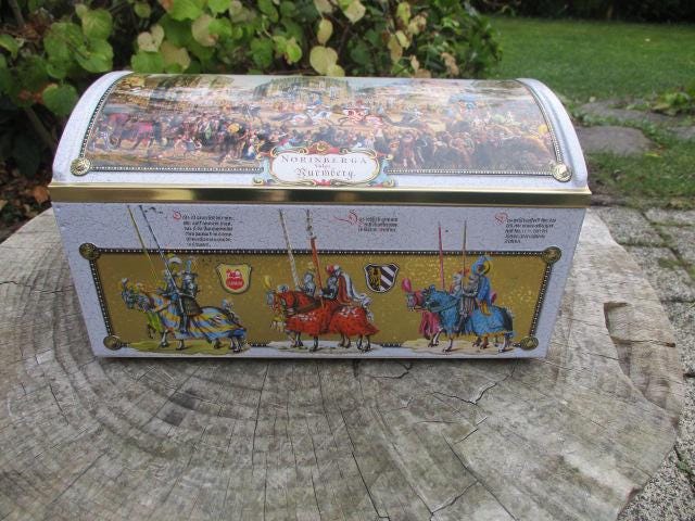 large chest, cookie tin, Schmidt, gingerbread, Nuremberg, tin can, metal, vintage, domed lid, knight's games, treasure chest