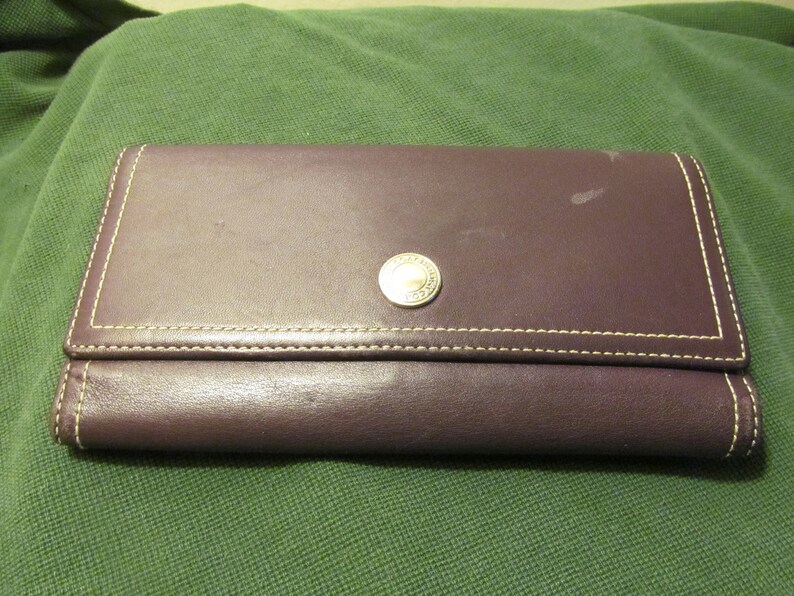 coach checkbook cover