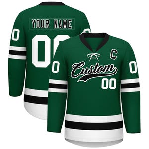 May include: A green hockey jersey with white and black accents. The jersey features the text "Custom" in a script font, the number "00", and the text "YOUR NAME" on the back. The jersey has a black collar and white stripes on the sleeves.