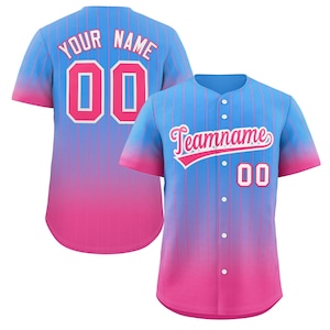 May include: A blue and pink baseball jersey with white pinstripes. The jersey has a white button-up front and a pink and blue ombre design. The back of the jersey has the text "YOUR NAME" and the number "00" in white with a pink outline. The front of the jersey has the text "Teamname" in white with a pink outline and the number "00" in white.