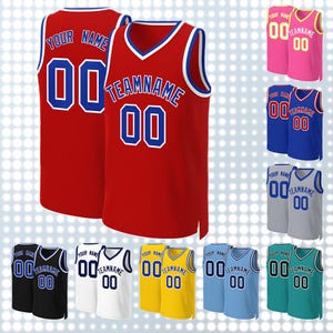 May include: Ten basketball jerseys in different colors with customizable text and numbers. The jerseys are red, pink, blue, gray, white, yellow, light blue, and green. The text on the jerseys says "YOUR NAME" and "TEAMNAME".