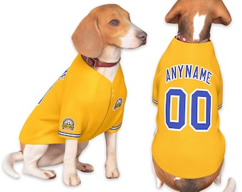 May include: Two dogs wearing yellow baseball jerseys. The jerseys have blue accents, the text "ANYNAME" and the number "00" on the back. The front of the jersey has a logo and the text "YOUR LOGO?".