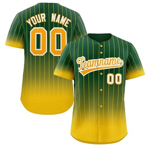 May include: Green and yellow baseball jersey with white pinstripes. The jersey has a gradient design with a darker green at the top and a lighter yellow at the bottom. The jersey has a button-up front and short sleeves. The back of the jersey has the text "YOUR NAME" and the number "00" in white with a yellow outline. The front of the jersey has the text "Teamname" in a yellow cursive font with a yellow outline and the number "00" in white with a yellow outline.