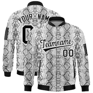 May include: Two bomber jackets with a snakeskin pattern in black, white, and gray. One jacket has "YOUR NAME" and a number on the back. The other jacket has "Teamname" and the number "00" on the front.