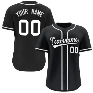 May include: Black baseball jersey with white piping and a white number "00" on the front and back. The back of the jersey has the text "YOUR NAME" above the number. The front of the jersey has the text "Teamname" in a white cursive font above the number.