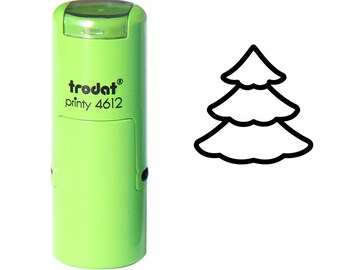 May include: Green self-inking stamp with the text "trodat printy 4612" and a black outline of a Christmas tree.
