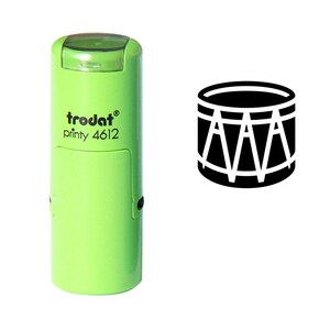 Puede incluir: Sellos de tinta automática verde con el texto "trodat printy 4612" y una imagen en blanco y negro de un tambor.