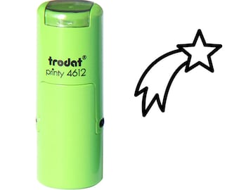 Op de afbeelding: Groene zelf-inktende stempel met de tekst "trodat printy 4612" en een zwarte omtrek van een vallende ster met een ster aan het einde.